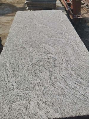 大漠流金與浪淘沙花崗巖石材 優(yōu)質墻體干掛與批發(fā)加工全解析